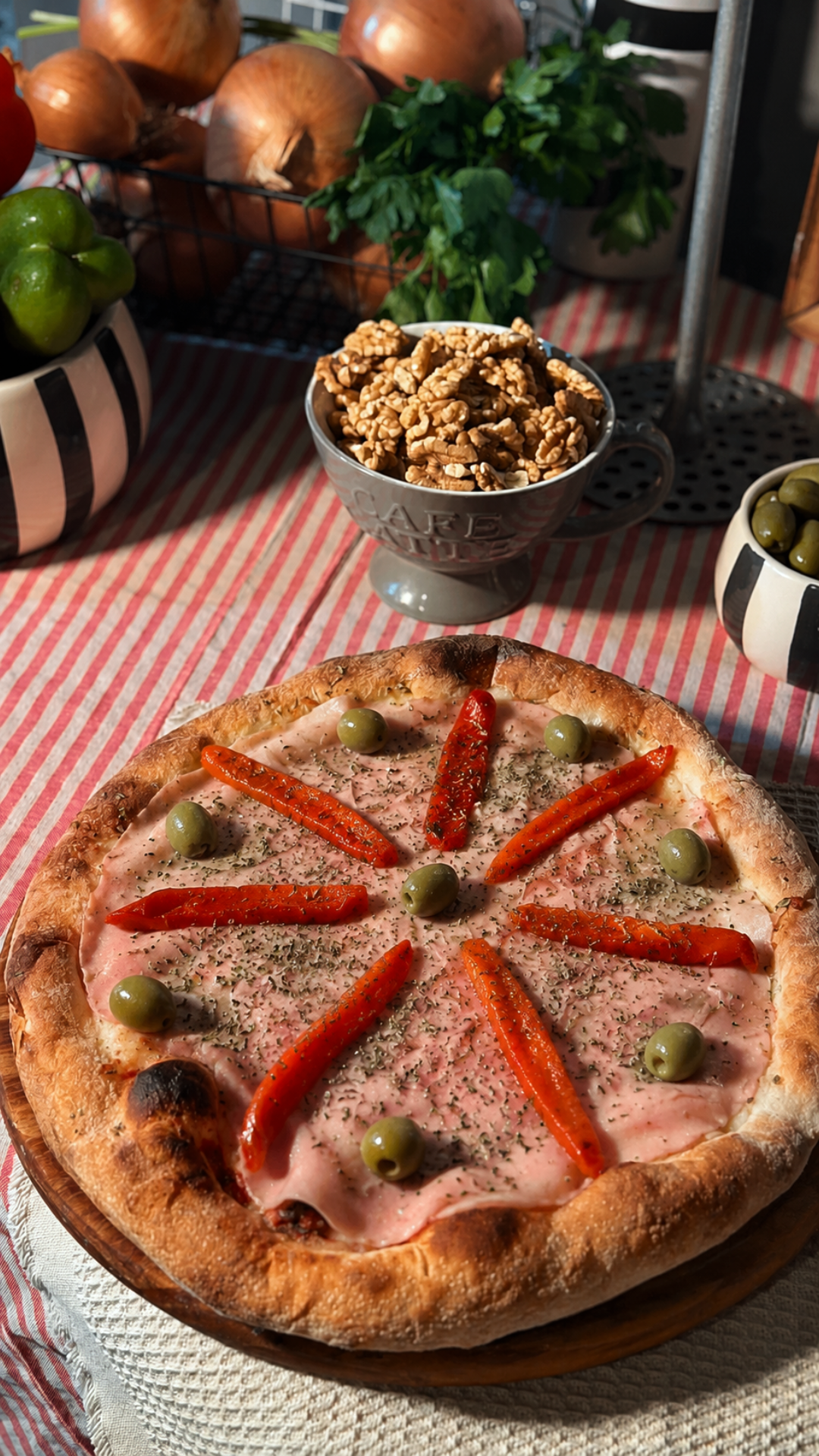 Pizza de jamón y morrones de La Antigua